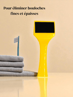 Charger l'image dans la galerie, Déboucheur jaune debout, posé à côté de serviettes